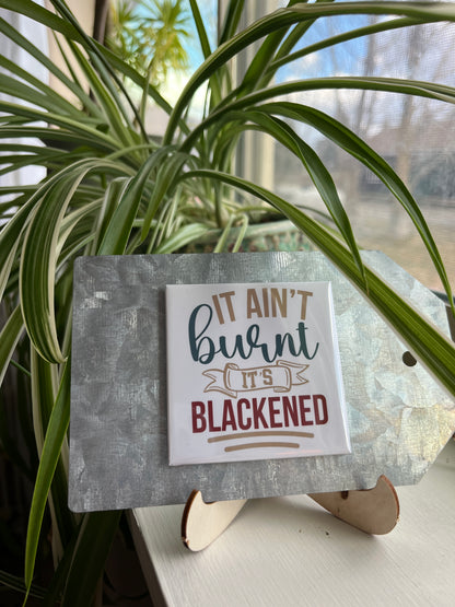 It Ain’t Burnt 2.5" Square Magnet
