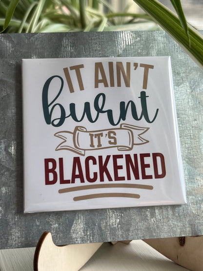 It Ain’t Burnt 2.5" Square Magnet