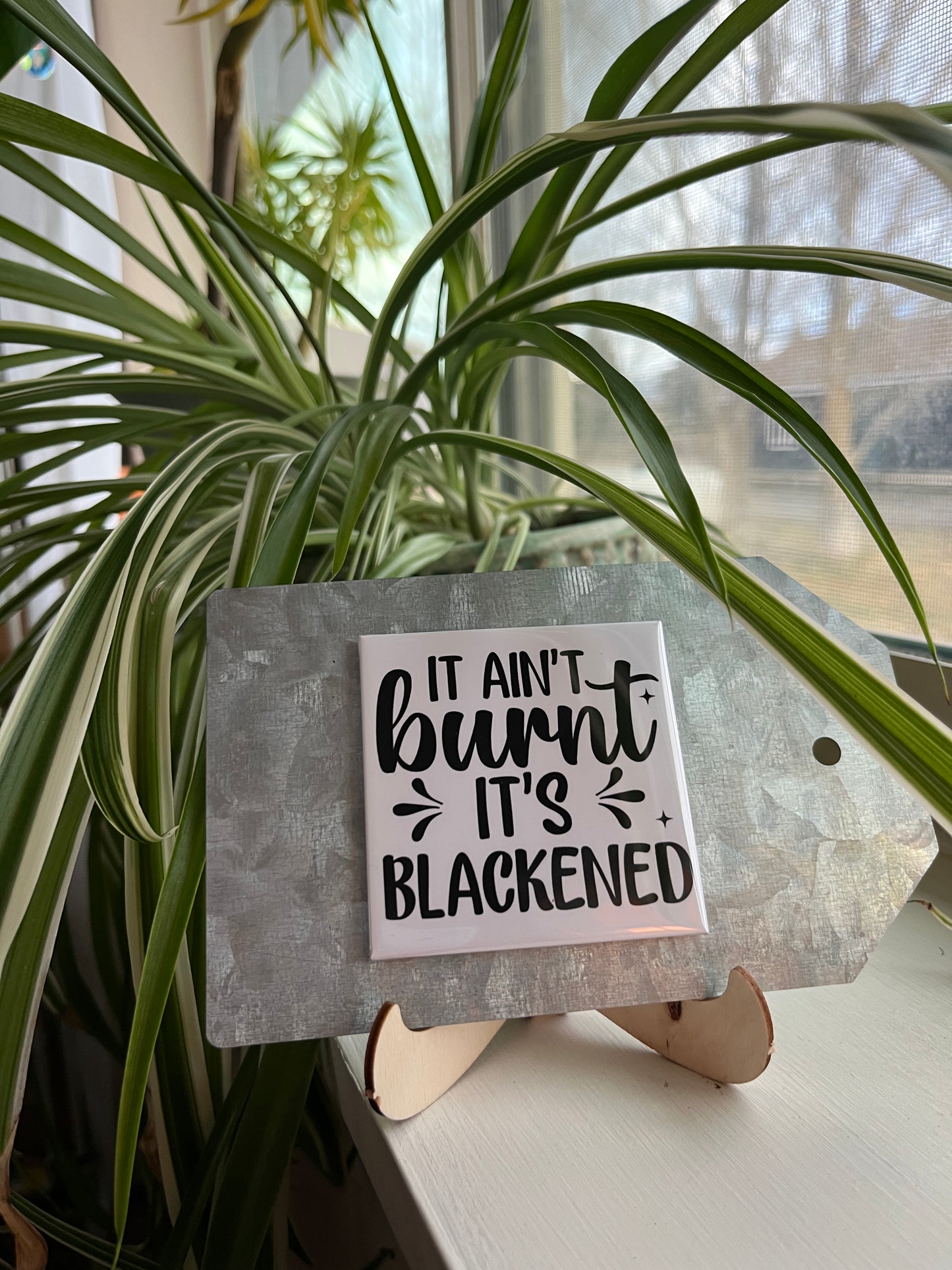 It Ain’t Burnt It’s Blackened 2.5" Square Magnet