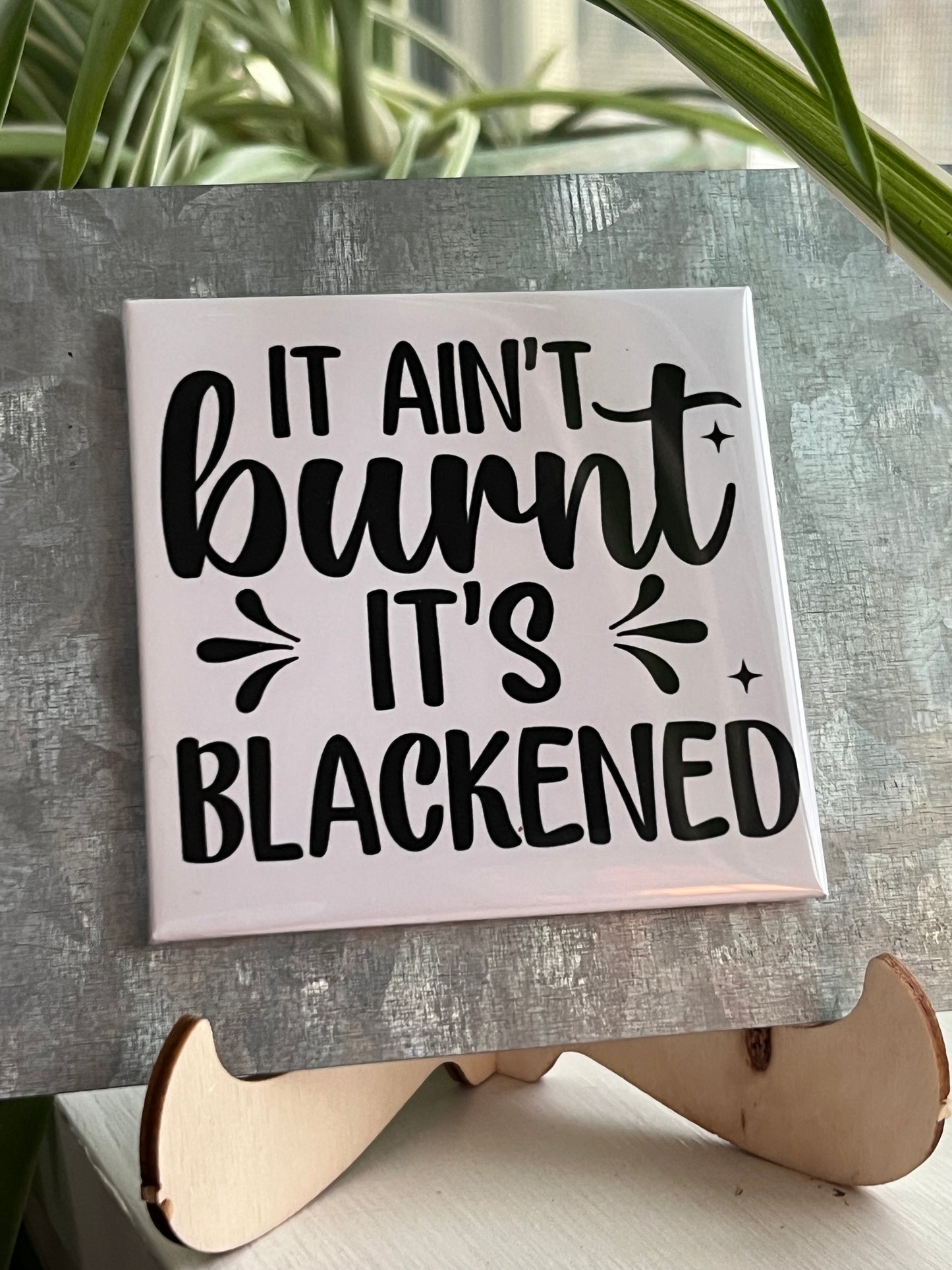 It Ain’t Burnt It’s Blackened 2.5" Square Magnet